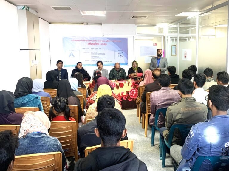 He is speaking in front of a seminar